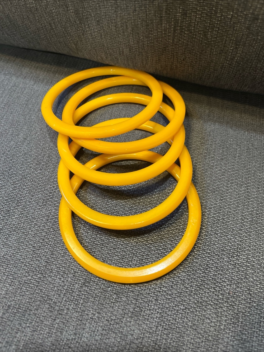Full Set of vintage 1940’s Bakelite butterscotch stacking bangles 7.8”